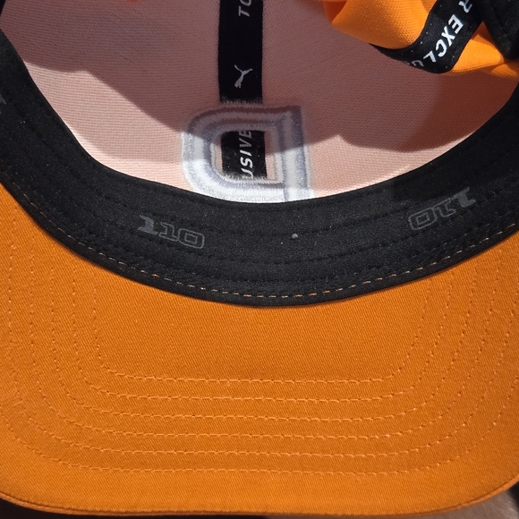Puma P 110 Snapback Golf Hat in the color Vibrant Orange #022537-09 - Picture 7 of 10